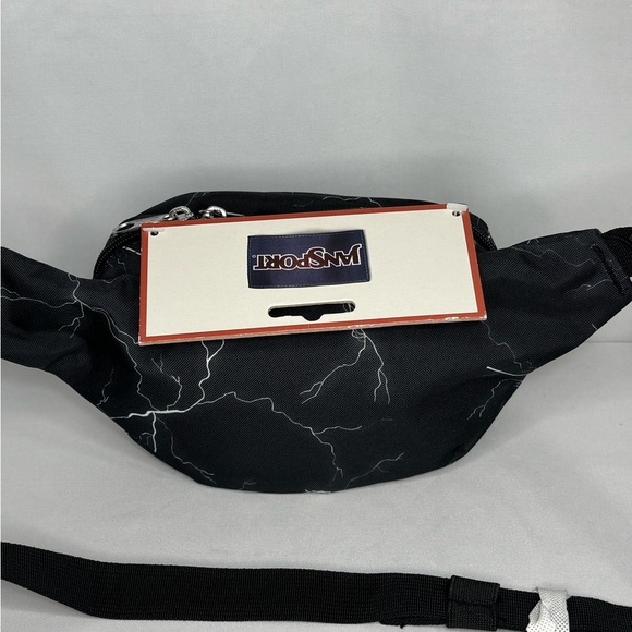 Jansport Fifth Avenue Electric Bolts cross body
Bag - Picture 3 of 10